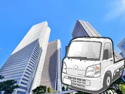 法人様にエコタス福岡のトラックが不用品の回収に向かっている写真